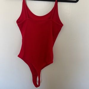 Red body suit